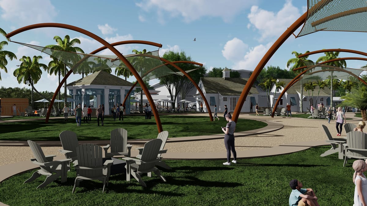 Outdoor patio with curved canopies, grass, Adirondack chairs, and people engaging in activities.
