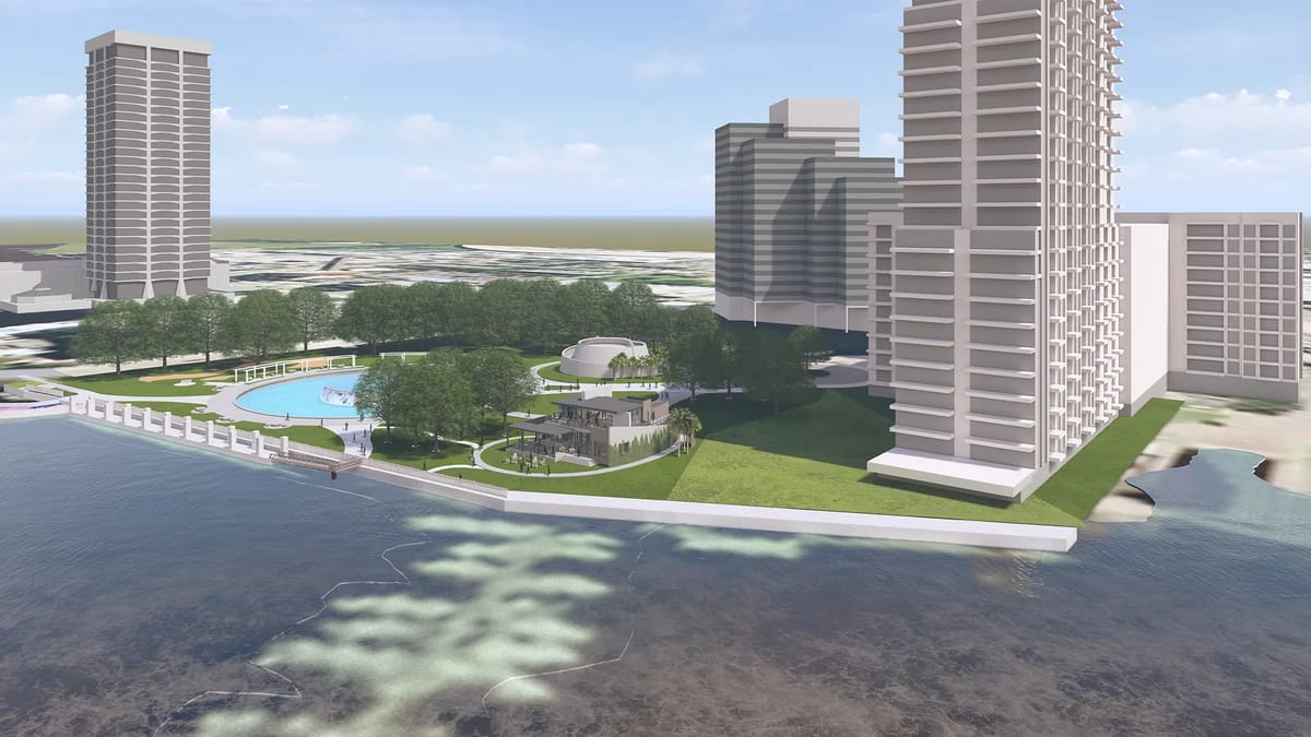 Urban development with high-rise buildings, green space, and a pool.