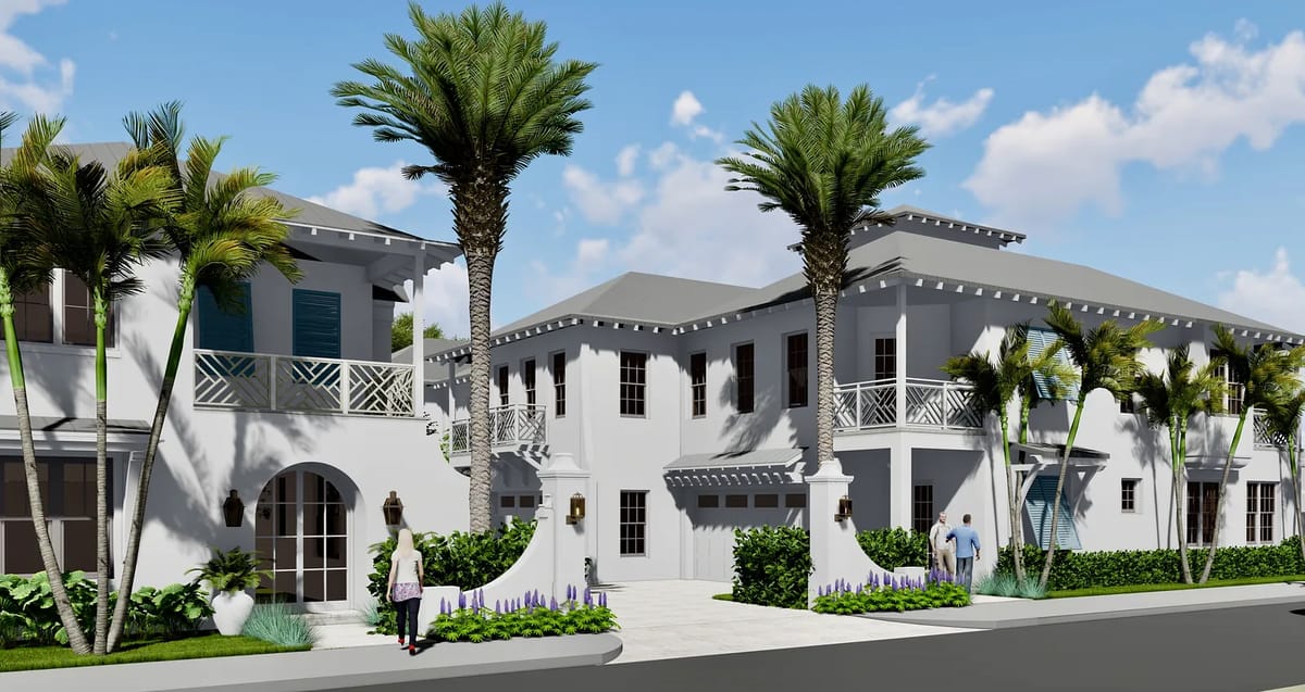 Exterior front view of a building complex with white buildings, gray roofs, balconies, and palm trees.