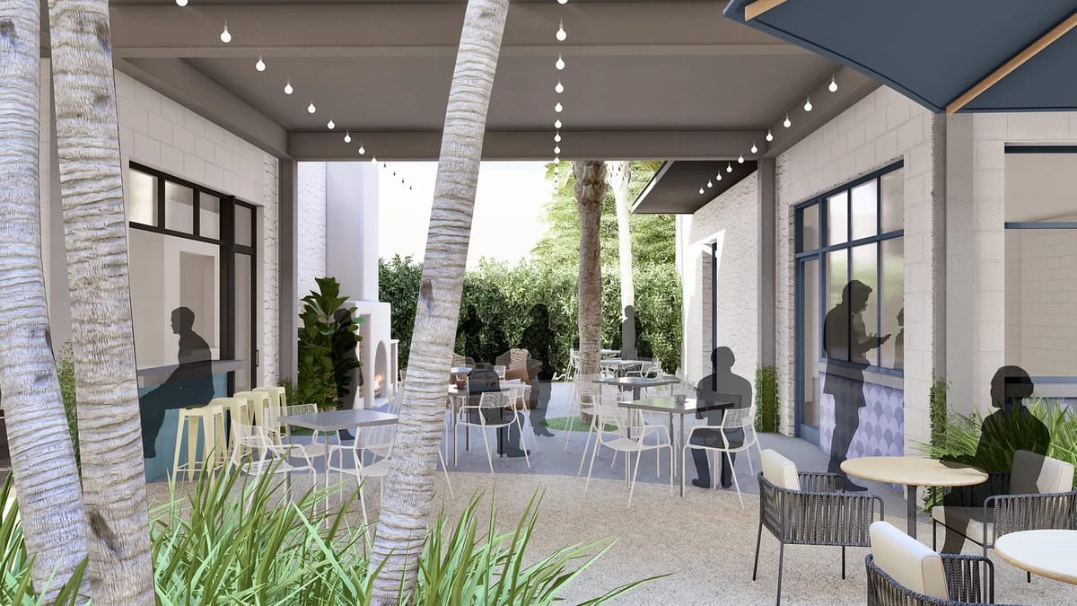 Patio with round tables, white chairs, blue canopy, and potted plants under a large overhang.