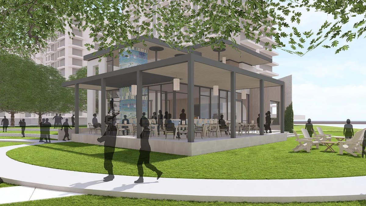 Exterior pavilion with glass walls, wood ceiling, outdoor seating, trees, and a winding pathway.