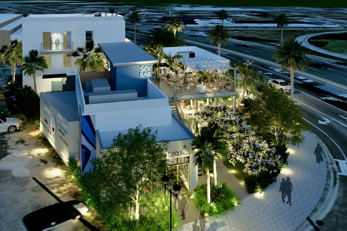 Exterior view of a building with outdoor seating, sky bar, palm trees, and landscaped greenery.