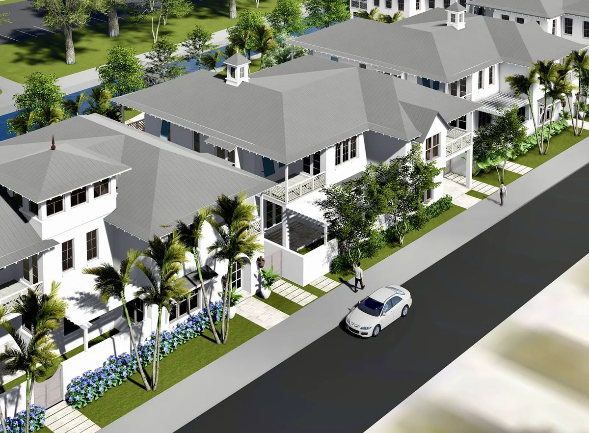 Exterior front view of houses with gabled roofs, porches, and landscaped gardens along a street.