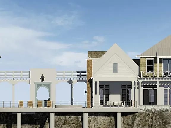 Exterior view of a multi-level house with varied roofing, windows, porch, and terrace seating.