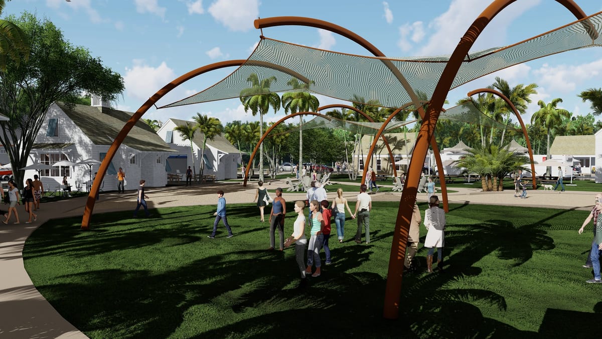 Outdoor space with canopies, people, grass, palm trees, and small buildings.