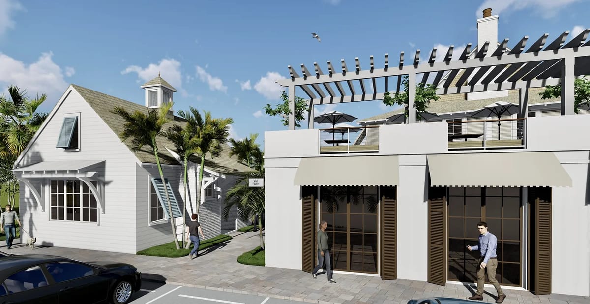 Exterior view with two buildings, palm trees, seating areas, and clear sky.