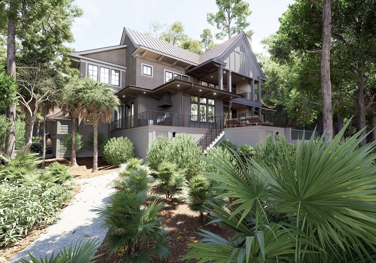 Exterior view of a multi-level house with large windows, staircase, patio, and surrounding greenery.