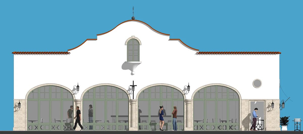 Exterior facade with arched windows, doors, tile trim, and stone detailing.