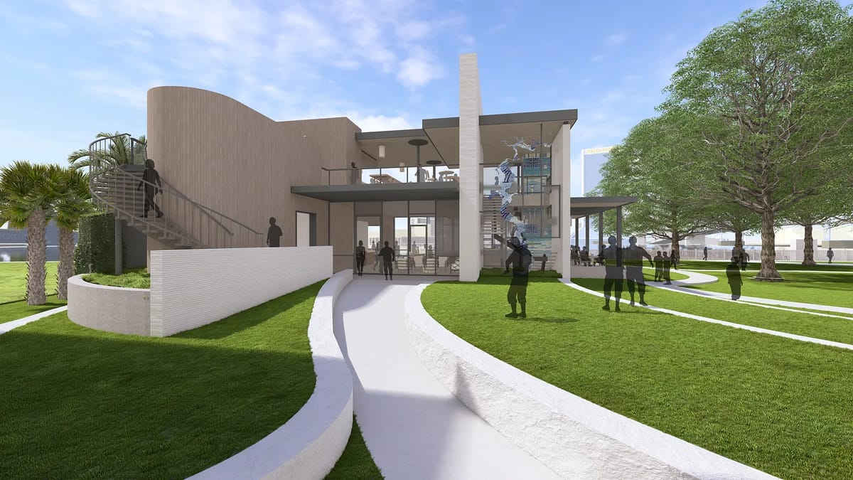 Exterior front view of a house with large windows, curved wall, staircase, and surrounding landscape.