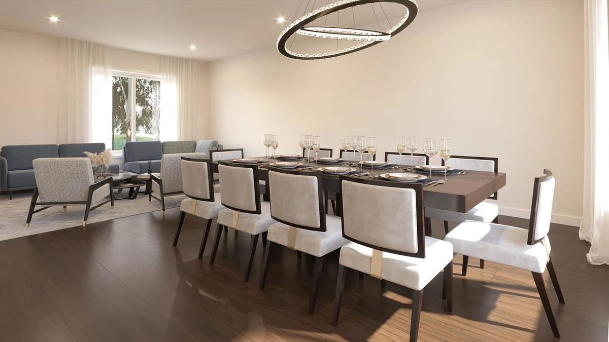 Dining room with large table, ten chairs, dinnerware, two seating areas, and natural light from large windows.