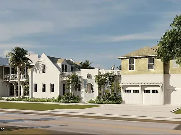 Front view of two houses with balcony, peaked roof, palm trees, and a landscaped yard.