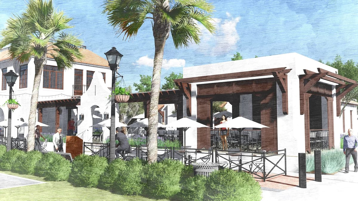 Patio with outdoor tables, chairs, umbrellas, palm trees, and decorative landscaping.