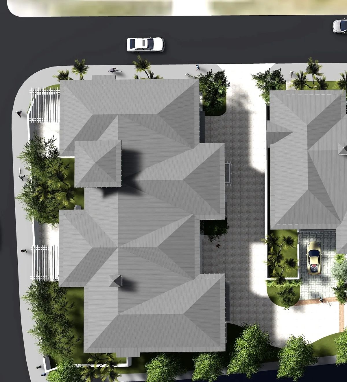 Aerial view of a property with multiple roofs, driveway, gardens, and a parked car.