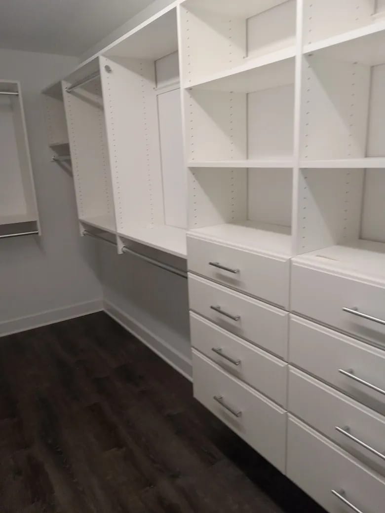 Custom walk in closet and cabinetry freshly built in