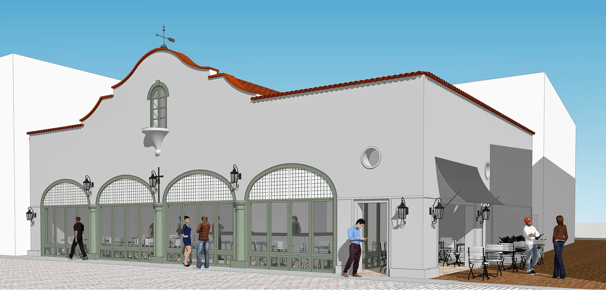 Exterior front view with arched windows, outdoor seating, and decorative roof.