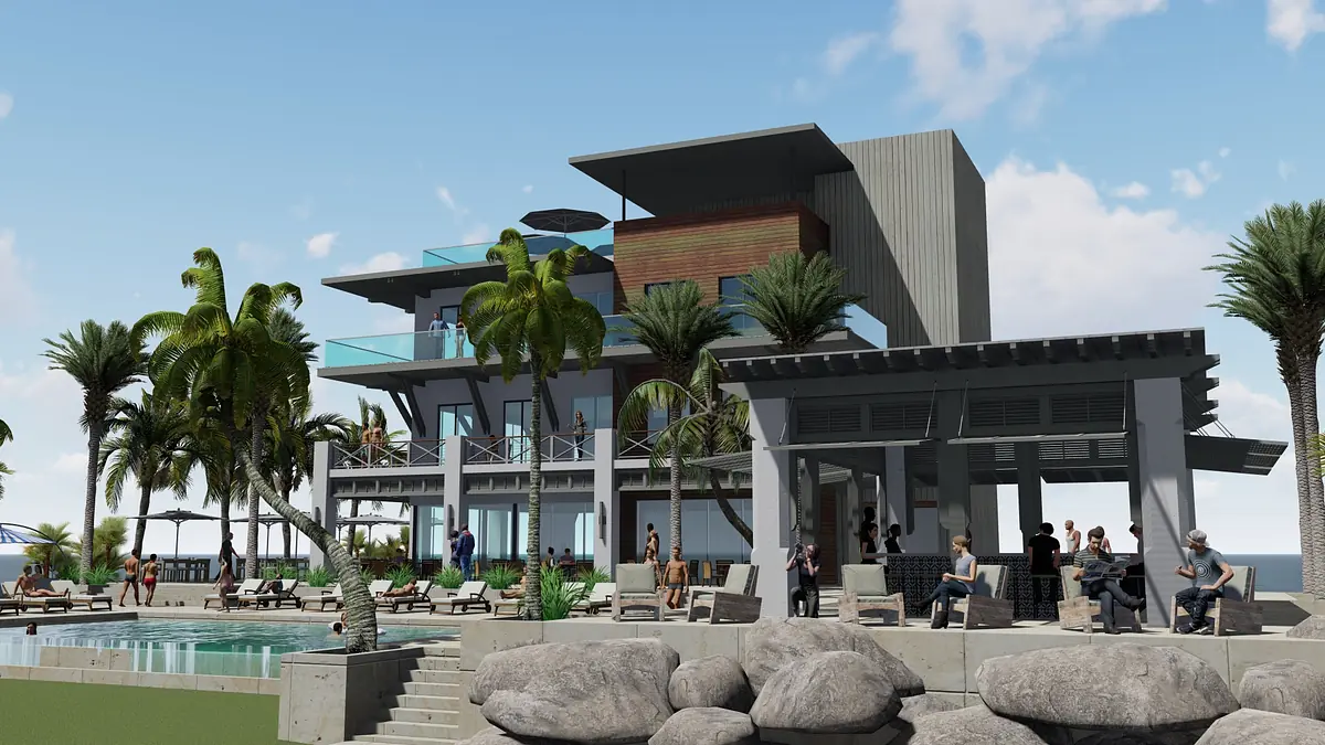 Multi-level building with balconies, pool area, palm trees, and rocky landscaping in an outdoor setting.