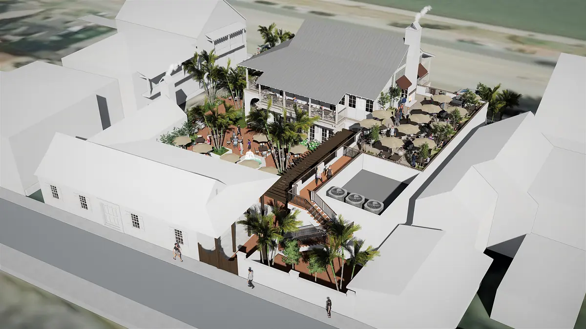 Exterior view of a building with outdoor seating, palm trees, stairs, and a swimming pool area.