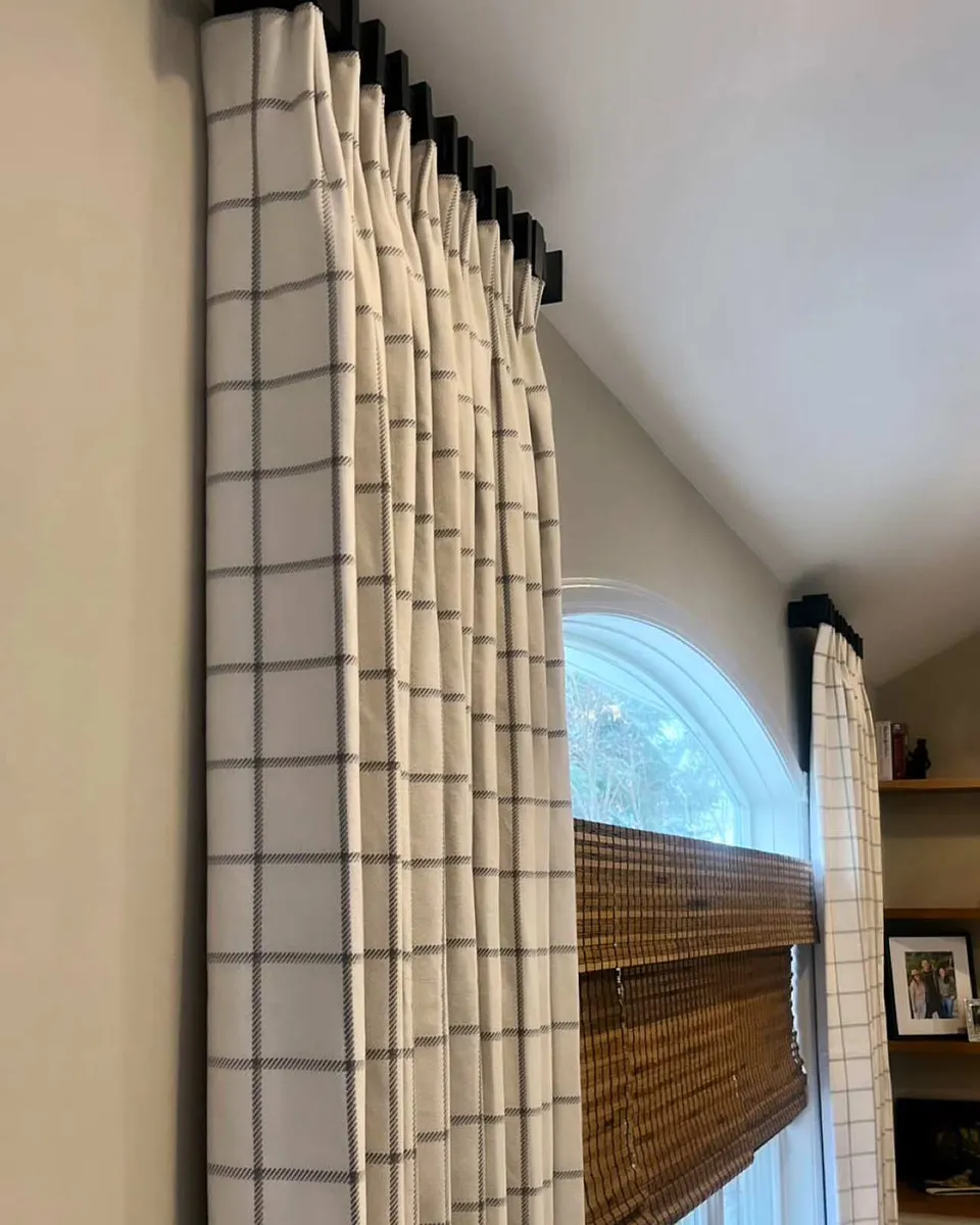 The perfect pairing of layers, Bespoke drapes and woven wood shades