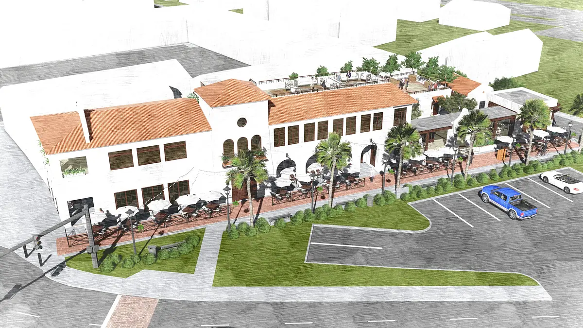 Building exterior with terracotta roof, large windows, outdoor patio, and palm trees