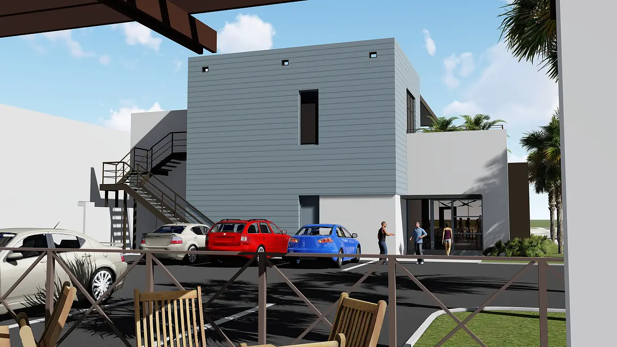 Exterior front view of a two-story building with patio area, cars, and palm trees.