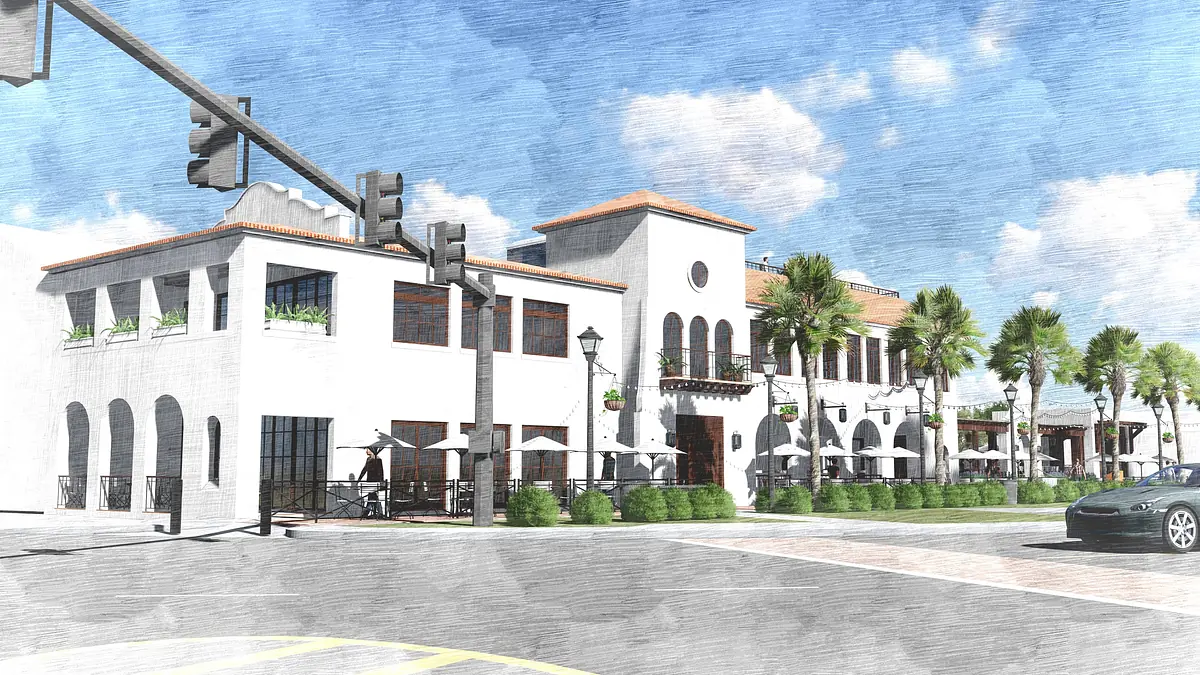 Exterior front of a building with arch windows, balconies, and outdoor seating areas amidst palm trees.