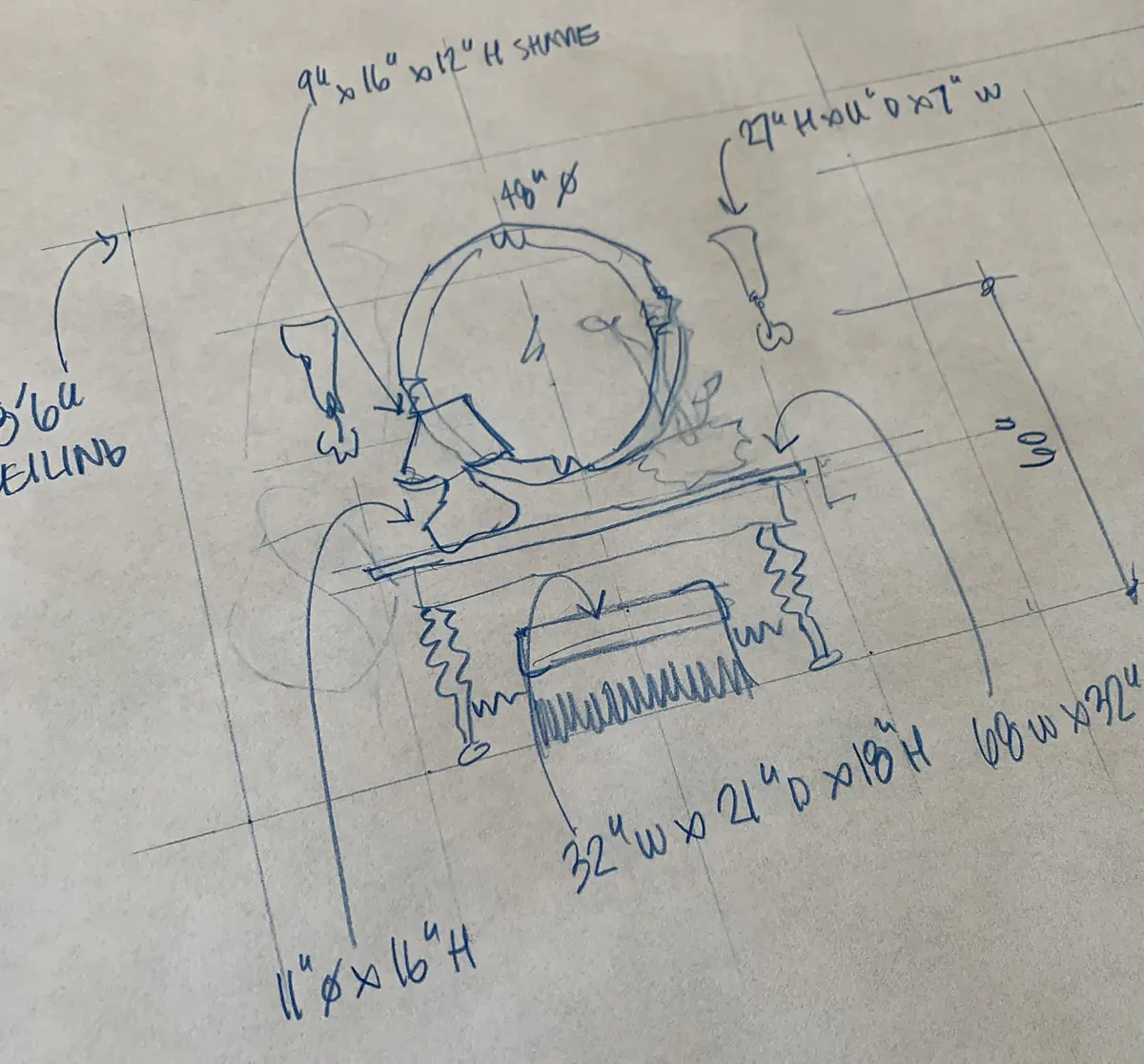 Sketch of furniture layout with dimensions for table, mirror, and sconces.