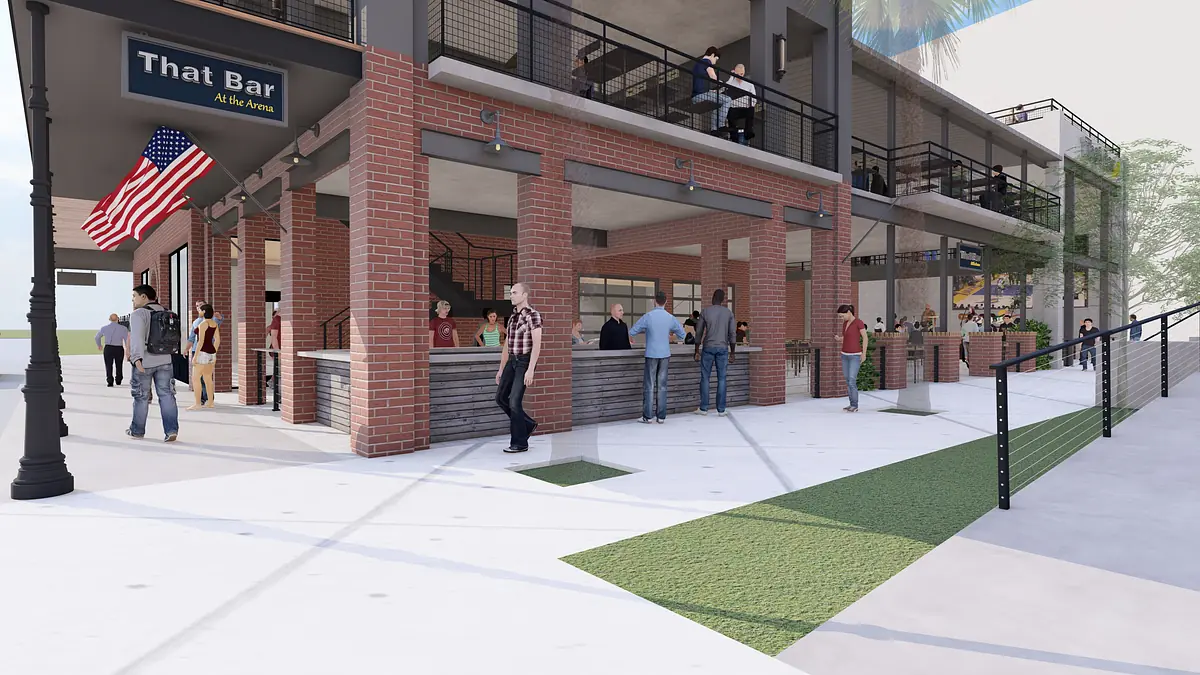 Exterior front of a bar with brick facade, outdoor seating, sign, and American flag.
