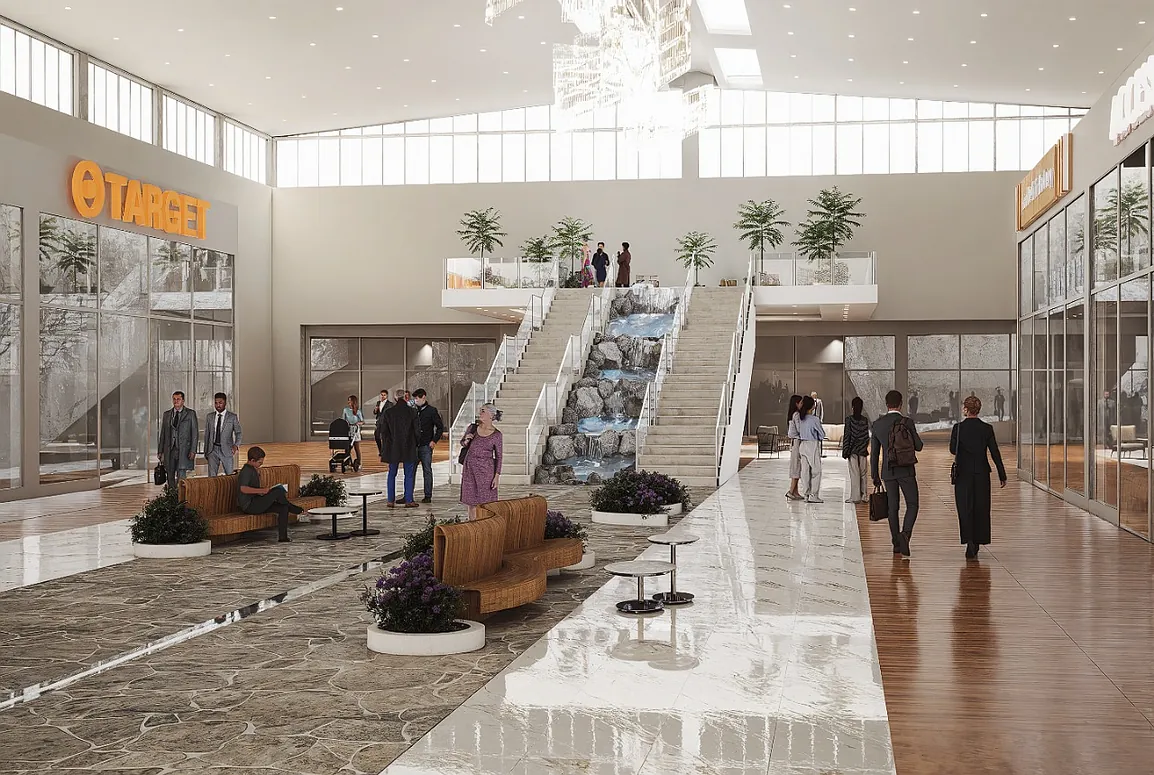 Open commercial space with a central staircase, seating areas, plants, and large glass windows.