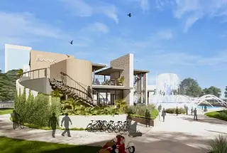 Outdoor area with modern building, staircase, bike rack, and landscaped greenery.
