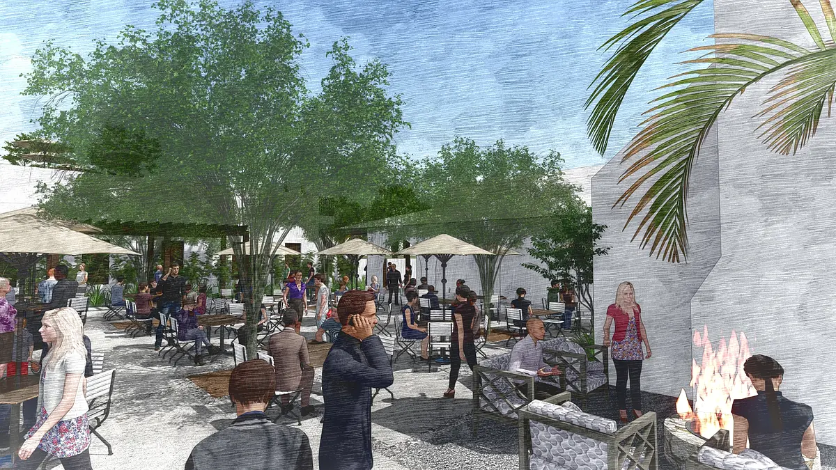 Outdoor patio with tables, chairs, umbrellas, potted plants, groups of people, and a fire feature.