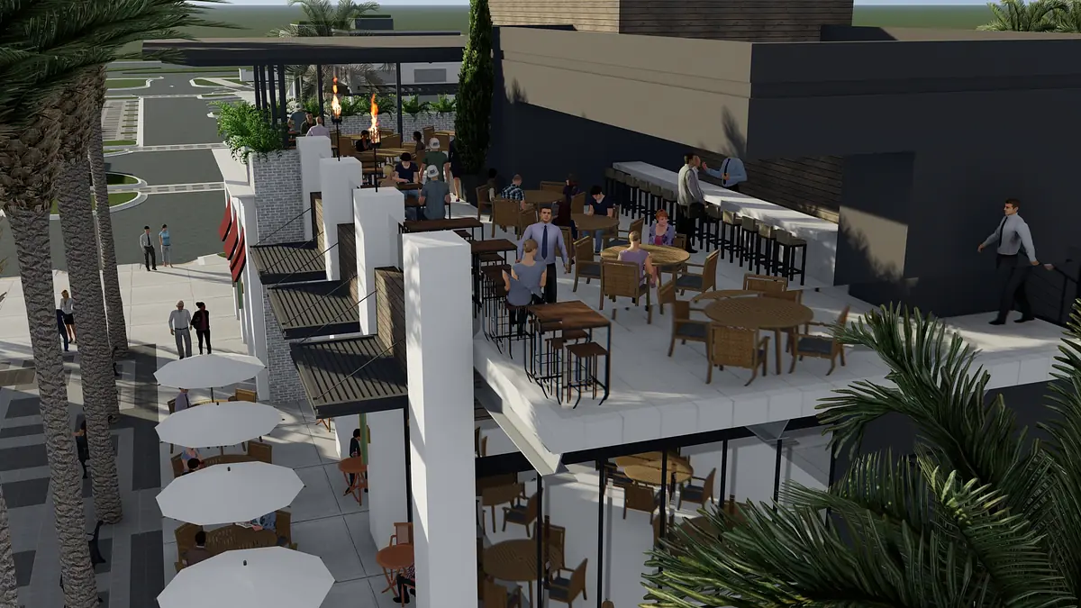 Patio area with outdoor tables, chairs, umbrellas, potted palm trees, and people seated and walking around.