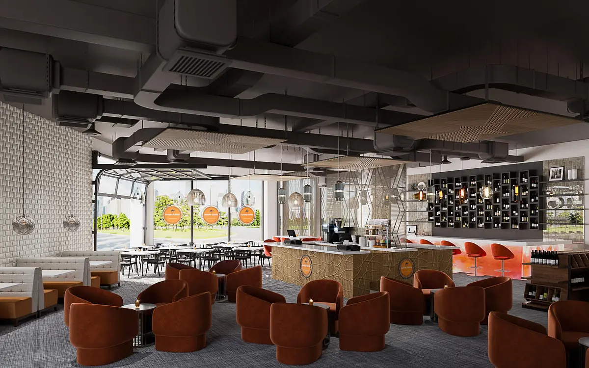 Modern space with bar, upholstered seating, round tables, and large windows providing outdoor views