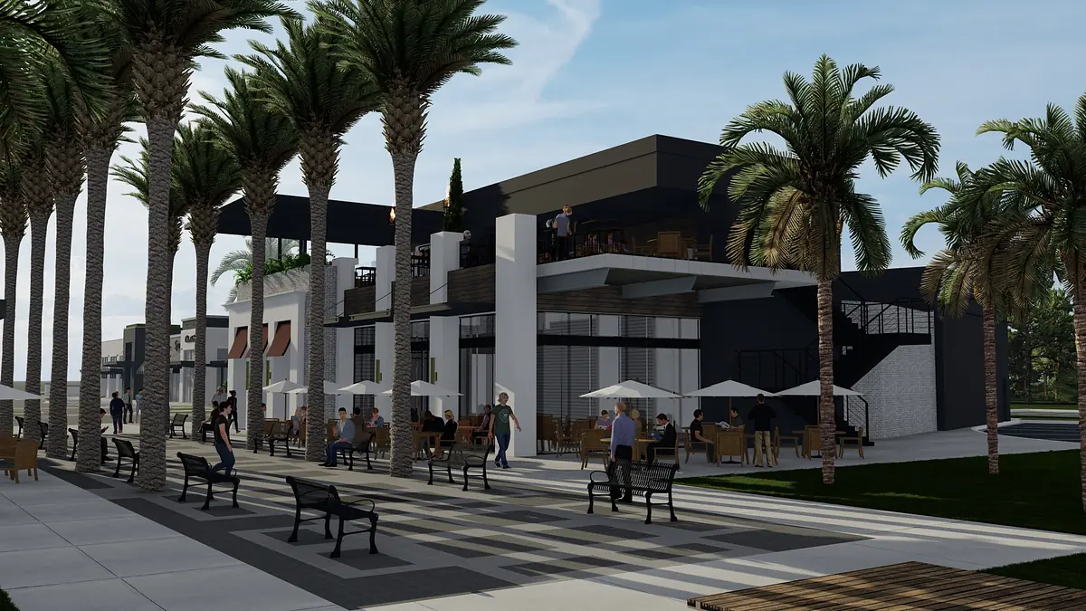 Exterior front view of a multi-story building with palm trees, seating area, and modern design.