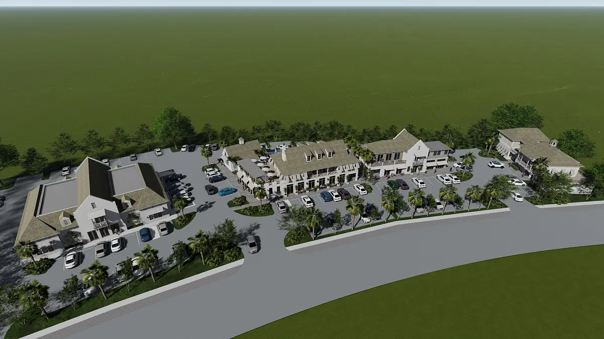 Exterior view of a commercial complex with multiple buildings, parking, and landscaping.