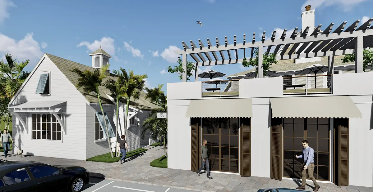 Exterior view with two buildings, palm trees, seating areas, and clear sky.