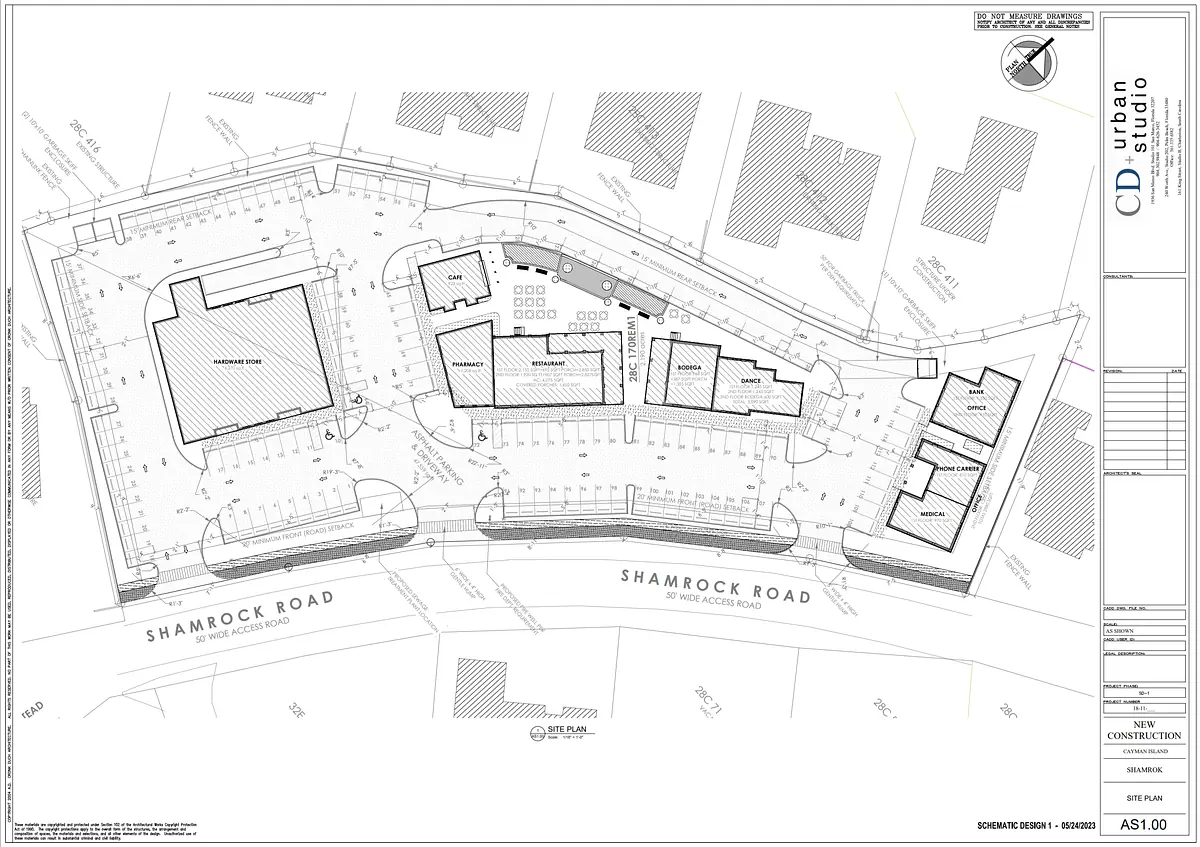Site plan for new construction with building layouts, parking areas, and landscaping features.