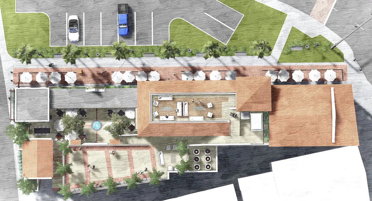 Outdoor space with seating areas, swimming pool, landscaping, and parking lot with umbrellas and pathways.