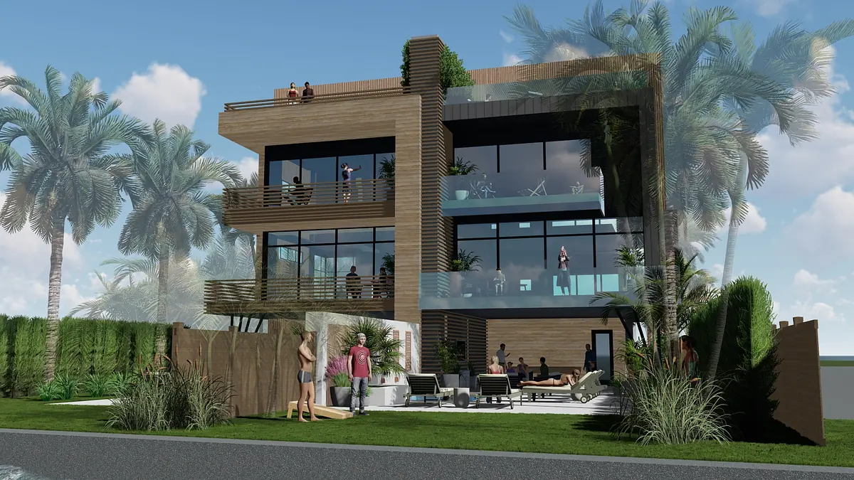 Modern exterior view of a three-story building with glass windows, balconies, and outdoor seating area.