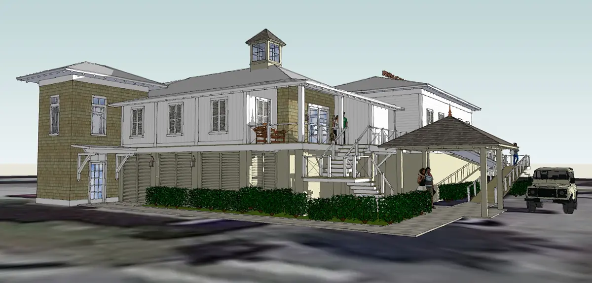 Front exterior of a two-story house with gabled roof, cupola, covered porch, and shrubs