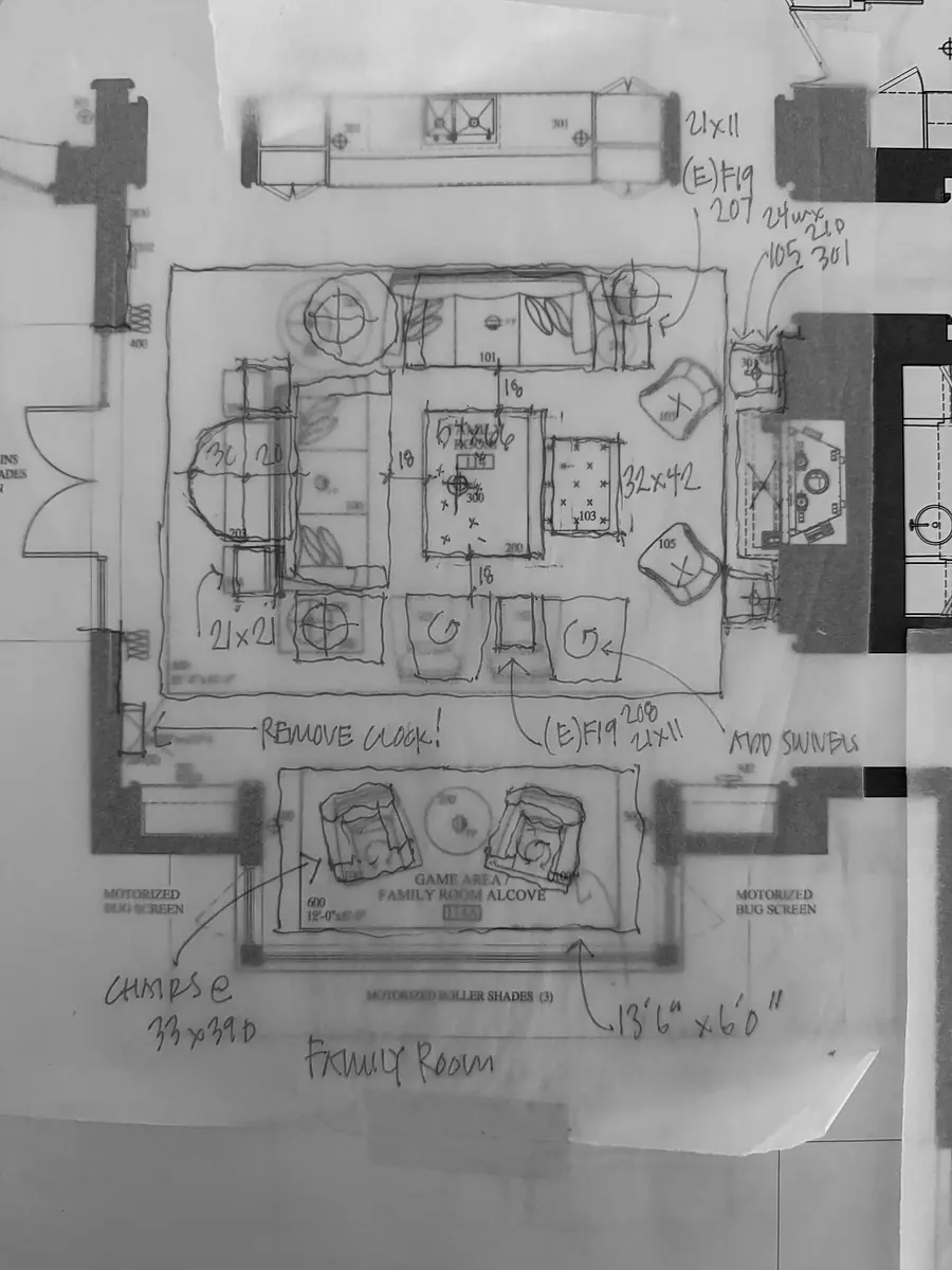Floor plan of a family room with furniture arrangement and dimensions indicated.