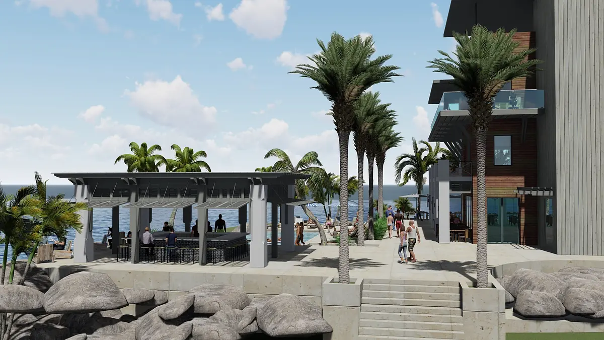 Patio with pavilion, outdoor seating, dining area, palm trees, and ocean view.