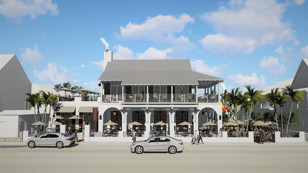 Two-story building with grey roof, arched windows, patio, palm trees, and street parking.
