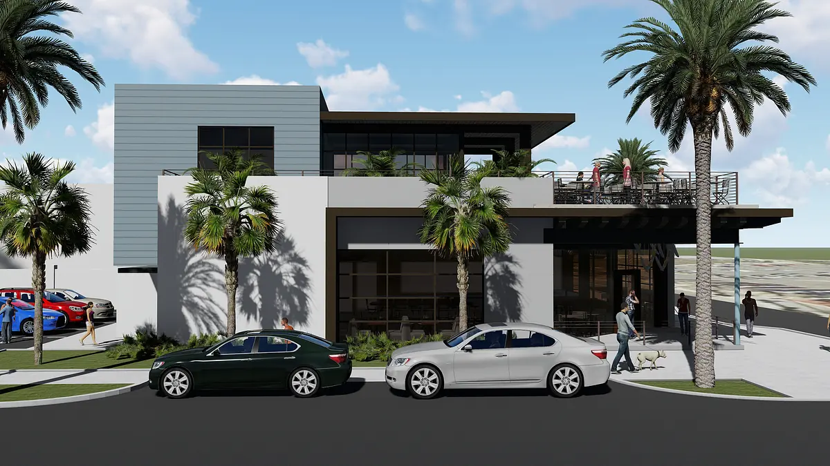 Modern building exterior with large windows, palm trees, patio, and parked cars in front.