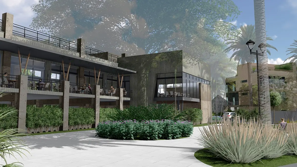 Exterior view of a building complex with large windows, landscaped area, and pathway.