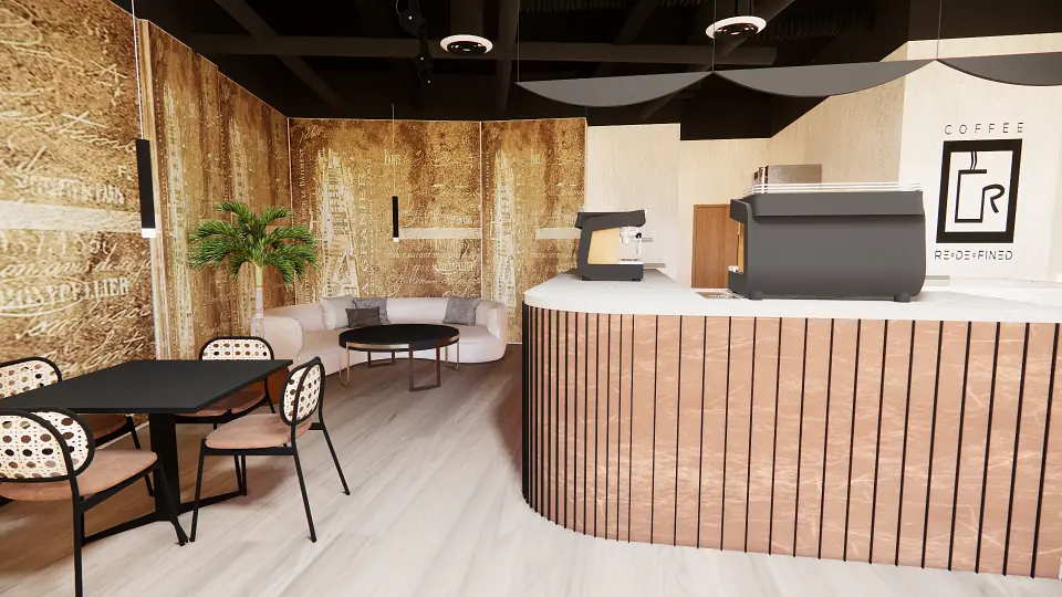 Interior space with curved counter, pink sofa, black table, and patterned chairs.