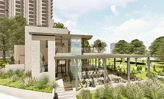 Contemporary building exterior with layered stone facade, large windows, and covered patio area.
