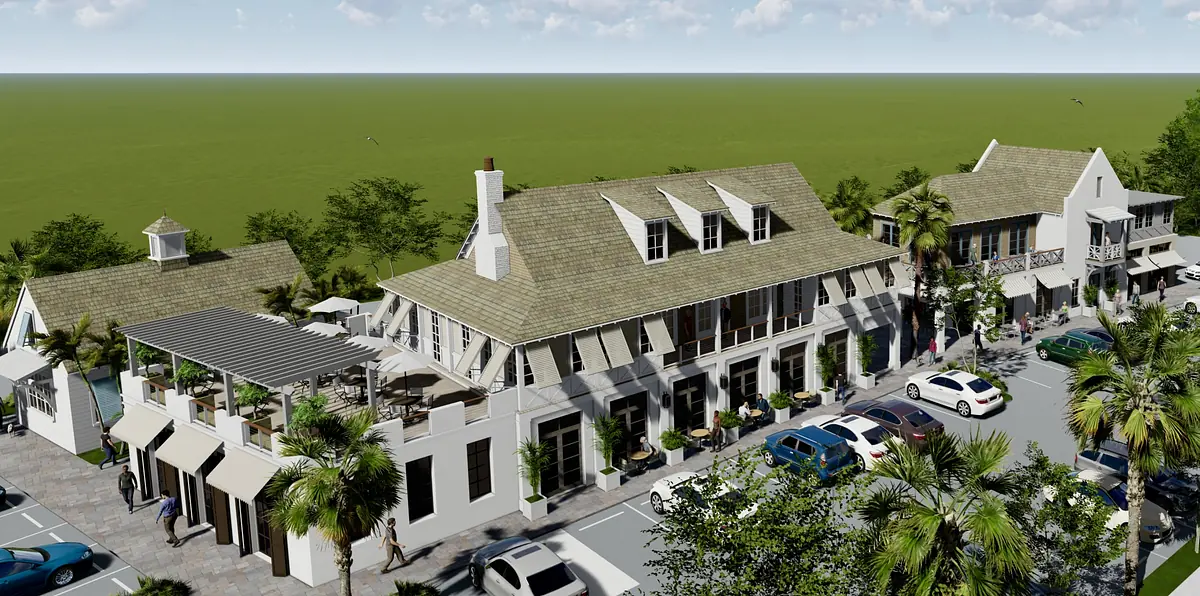 Exterior view of a mixed-use building with gabled roofs, balconies, and palm trees.